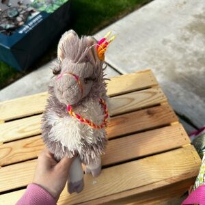 Douglas Zephyr Llama plush toy.